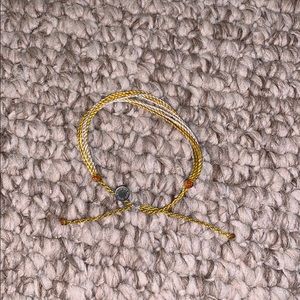 yellow and white pura vida braclet
